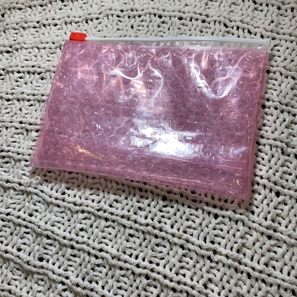 Glossier makeup bag
